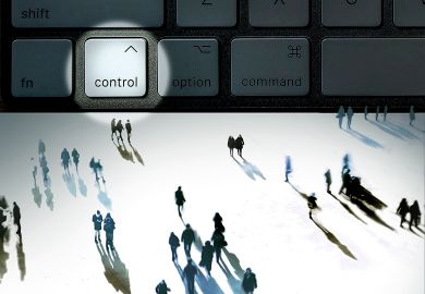 Concept image of a group of people around a control key on a computer Concept image of a group of people around a control key on a computer to illustrate Digital strategy can’t be left to CIOs; senior leaders must take ownership