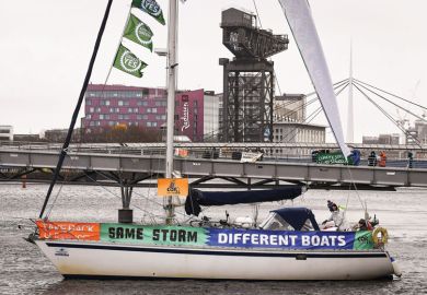 Activists hold a demonstration marking the delayed COP26 UN climate negotiations 
