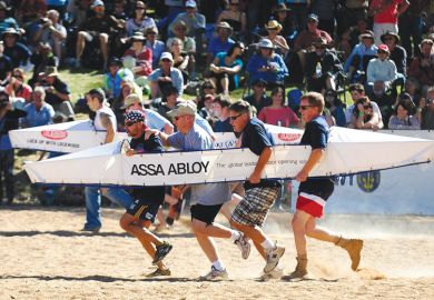 Competitors running in a in the bottomless rowing boat as a metaphor for Australian commercialisation push hampered by lack of data