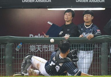 Chien Fu Liao #58 of Rakuten Monkeys miss a fly ball at the top of the 8th inning during the CPBL game to illustrate Taiwanese universities ‘may fall short’ of 2030 bilingual goal