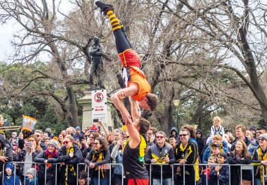 Australian Football League balance on each other to illustrate Regional universities can hold their own, deputy v-c insists