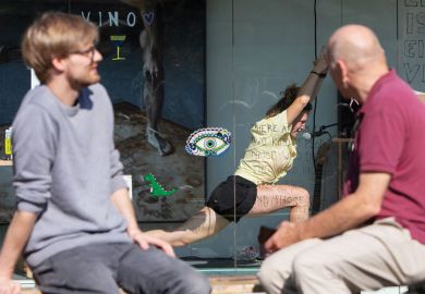 Two people watching an artist doing yoga in a container Two people watching an artist doing yoga in a container