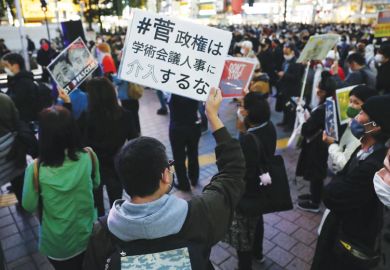 People stage a rally in Tokyo's Shibuya district on Oct. 18, 2020, against Japanese Prime Minister Yoshihide Suga's decision not to appoint academics who have been critical of the nation's security and anti-conspiracy legislation to the Science Council o People stage a rally in Tokyo's Shibuya district on Oct. 18, 2020, against Japanese Prime Minister Yoshihide Suga's decision not to appoint academics who have been critical of the nation's security and anti-conspiracy legislation to the Science Council o