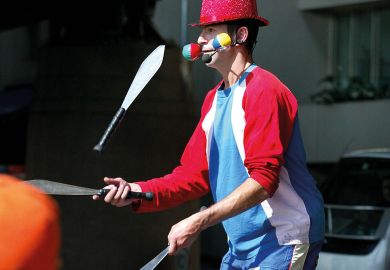 Busker juggles with three knives Busker juggles with three knives in Sydney, Australia to illustrate Nine in ten Australasian students juggling study with paid work