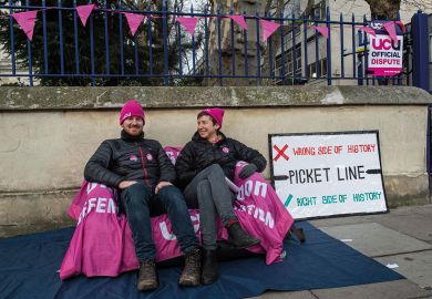 Striking UCU members attend their picket line at Queen Mary University of London to illustrate Resolving strikes requires ‘rethink of collective bargaining’