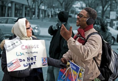 Two people having a disagreement over policies outside of the Renaissance Harborplace Hotel in Baltimore to illustrate If we are to disagree well, we must learn to balance humility and conviction