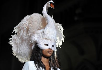 Woman wearing swan headdress