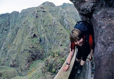 lady tight path smiling_climb_rocks getty.jpg
