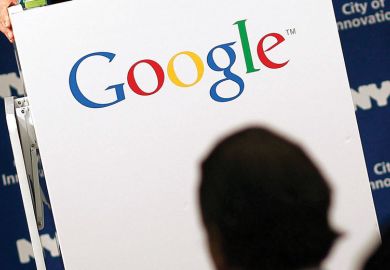 Shadow of person with Google logo