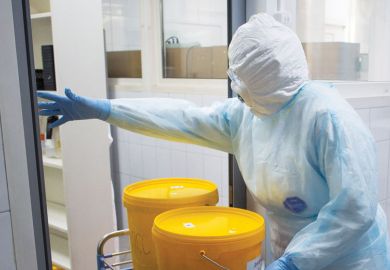 Health worker wearing personal protective equipment