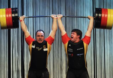 Weightlifters holding up a bar Weightlifters holding a bar over their heads symbolising new powers granted to PhD students to combat bullying and overwork