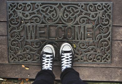 Welcome mat metaphor for scholarships incentive EU students in the UK