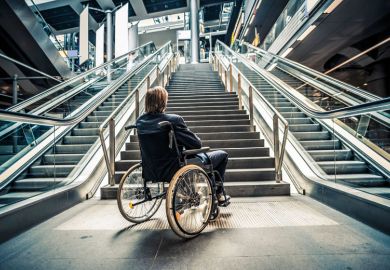 Wheelchair at stairs