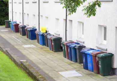 A row of wheelie bins A row of wheelie bins, symbolising quality over quantity