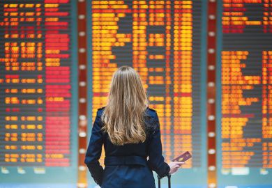 woman at departures board