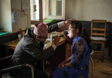 Woman getting check up at doctors