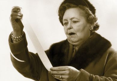 Woman horrified by reading printed receipt