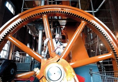 Woman in large wheel