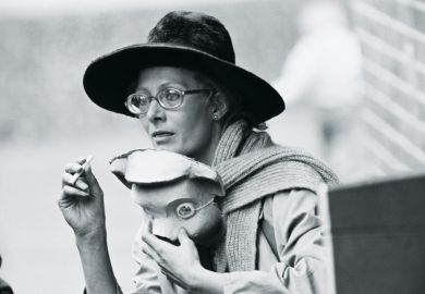 Woman takes off mask