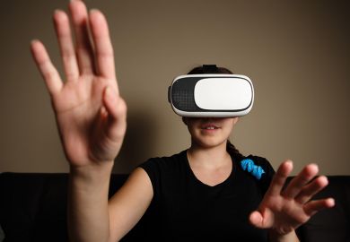 Woman wearing a virtual reality headset Woman wearing a virtual reality headset