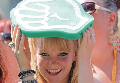 Woman with thumbs up sign