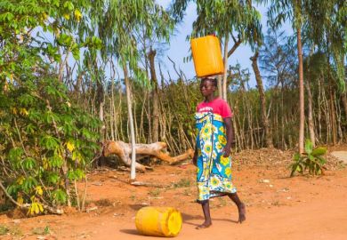 Woman carrying water