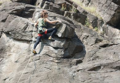 Woman climbing in Quincinetto