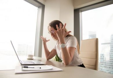 Woman frustrated with computer Woman frustrated with computer