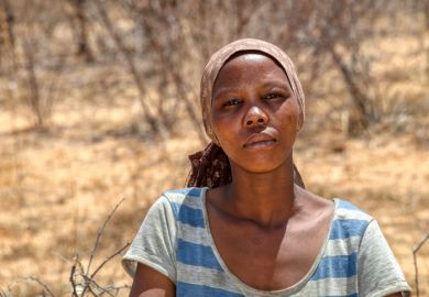 A woman in a Kalahari village, Botswana 
