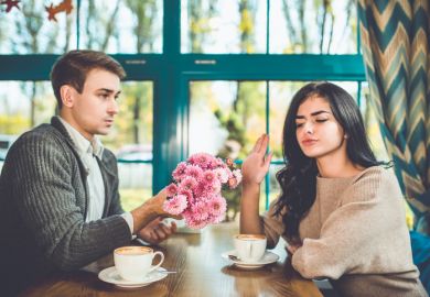 woman rejects flowers from man