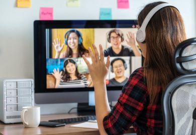 woman say hello with teamwork colleague in video conference when Coronavirus outbreak