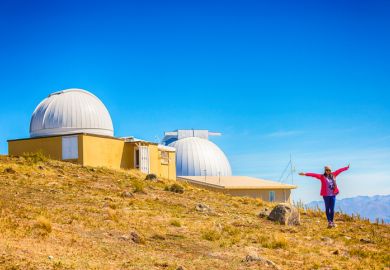 woman standing on Mt,John, Tekapo, Canterbury, New Zealand