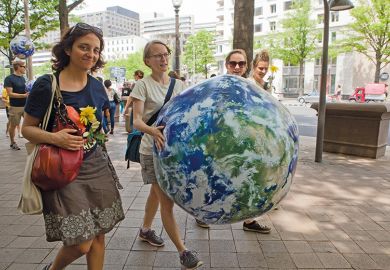 Women carrying the world