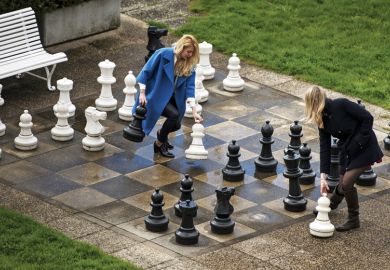 Women play chess on giant outdoor chessboard, Lausanne, Switzerland