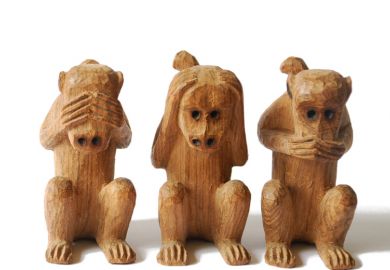 Wood-carved monkeys, see, hear, speak no evil Wood-carved monkeys, see, hear, speak no evil