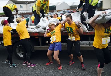 Women carrying heavy sacks