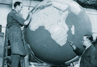 Men painting globe Men painting globe