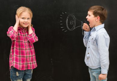 Young boy shouting at girl covering ears Young boy shouting at girl covering ears