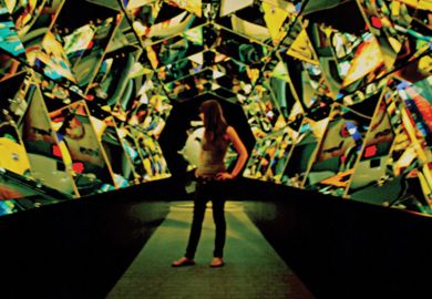 Young woman standing in hall of mirrors Young woman standing in hall of mirrors