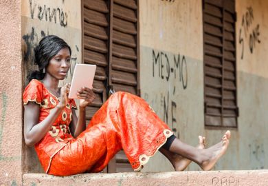 Young woman using tablet PC Young woman using tablet PC