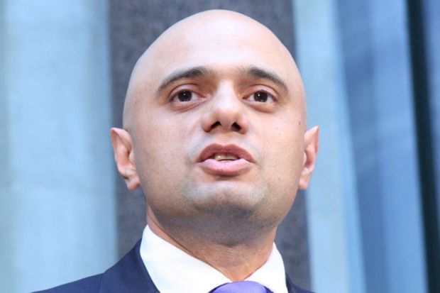 Sajid Javid speaking at podium