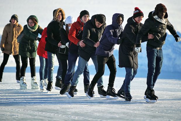 A group of ice skaters A group of ice skaters