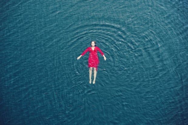 A woman floating in the sea A woman floating in the sea