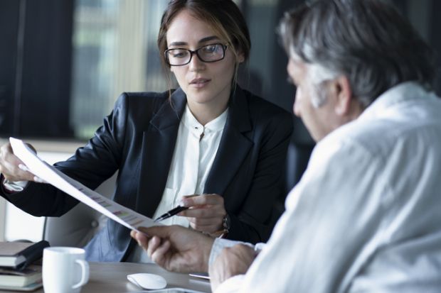 istock giving advice a woman advises a man