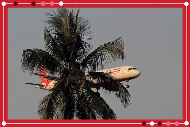 An Air India passenger flight prepares for landing at the Biju Patnaik International Airport seen behind a tree, illustrating branch campuses in India. An Air India passenger flight prepares for landing at the Biju Patnaik International Airport seen behind a tree, illustrating branch campuses in India.