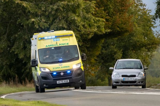 Ambulance overtakes a car Ambulance overtakes a car