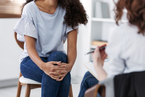 Anonymous photo of two women during group psychotherapy