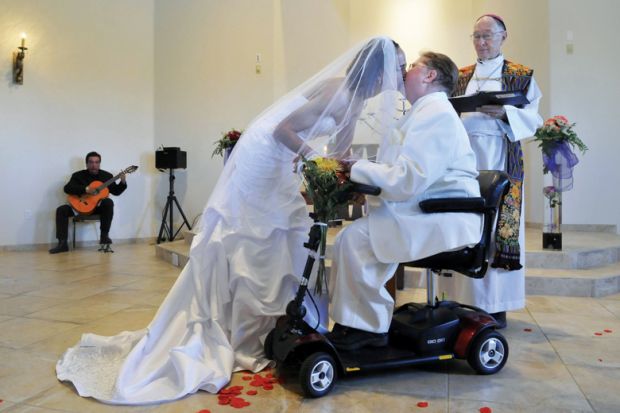 Archbishop Richard Gundrey performs wedding ceremony, Pojoaque, New Mexico