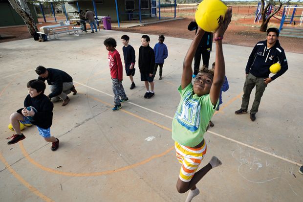 children playing basketball children playing basketball
