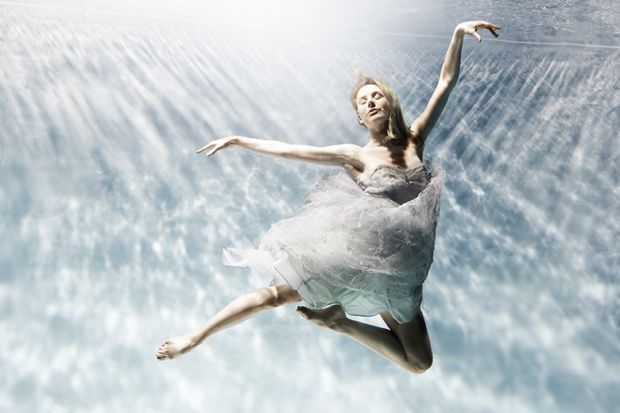 Woman making ballet pose underwater, illustrating that new REF rules ‘risk leaving researchers’ careers in limbo’ Woman making ballet pose underwater, illustrating that new REF rules ‘risk leaving researchers’ careers in limbo’